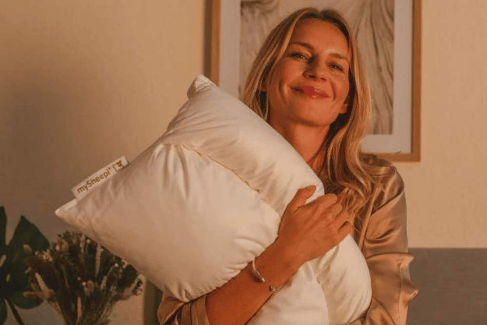 Happy woman holding mySheepi